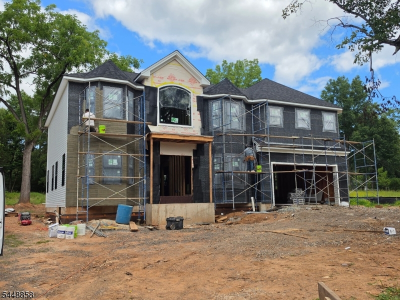 This image was captured the morning of August 31st. Set handsomely back from the curb the 2-story, traditional stands formidably on a gentle rise on the elevated side of Foothill Road.