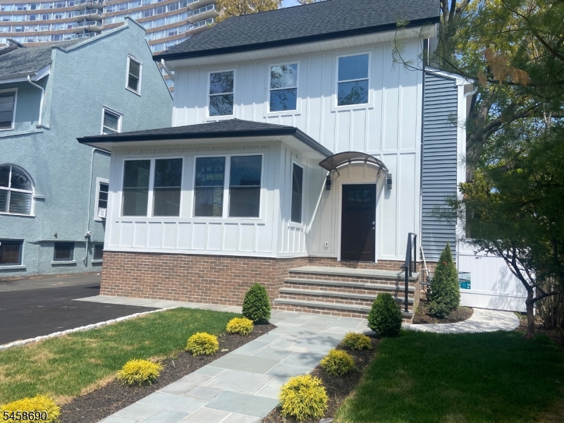 Vertical Siding, plenty of off street parking