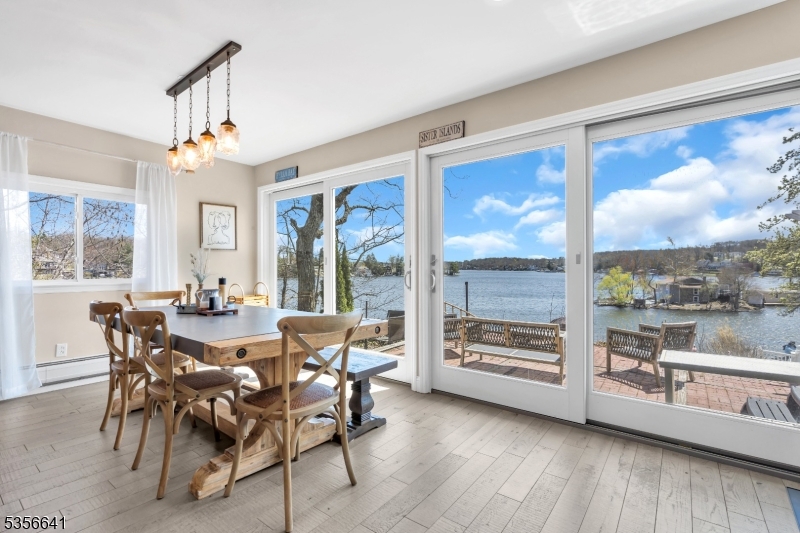 Dining open to lakefront patio