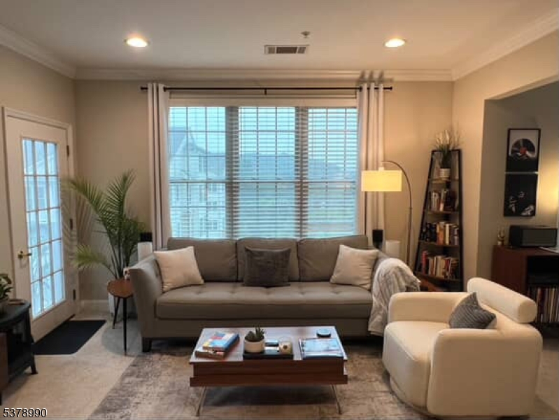 Den/Office/Guest BR off Living Room. French Door to open porch.  Have coffee on the porch in the morning and enjoy the beautiful mountain views and nature