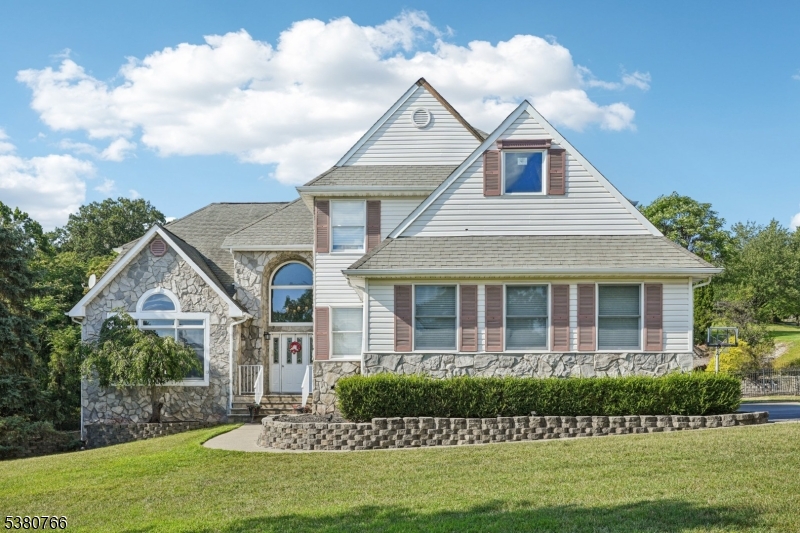 Welcome home to this exquisite 6 bedroom 6 bathroom Colonial situated on a beautifully manicured lot.