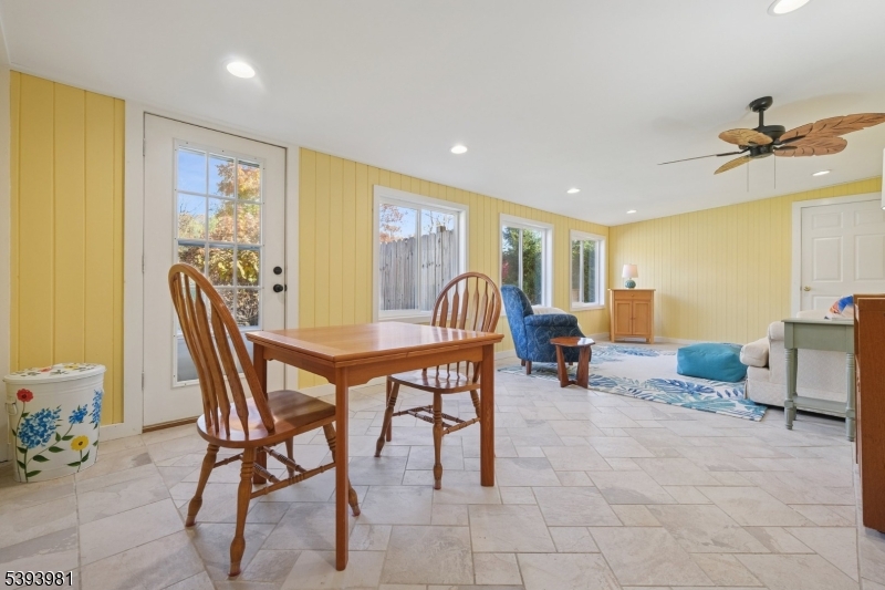 3 Season Room off Kitchen Cozy space offering backyard views. Don't miss the large storage closet!