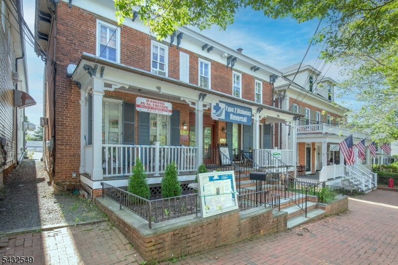 Gorgeous Brick Building fully Occupied with 7% Cap Rate.  In the Center of Town. Large Private Parking Lot Behind Building 2 Buildings on One Lot!