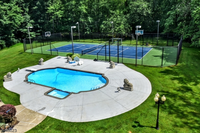 POOL WITH SPA - TENNIS ANYONE? OR OPT TO PLAY BASKETBALL OR PICKLEBALL ON THE LIT COURT