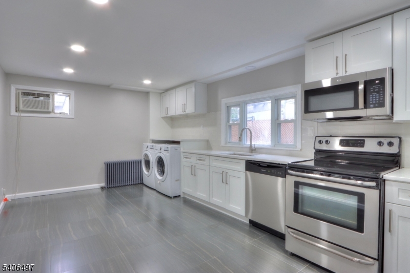 Large eat-in kitchen. New appliances and cabinets