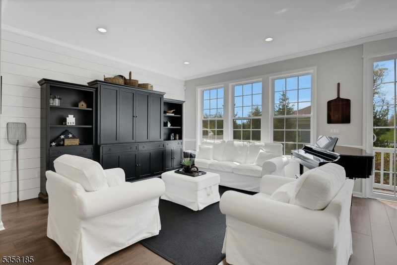 It's the details that bring a room to life- custom ship lap in the living area and neutral tones