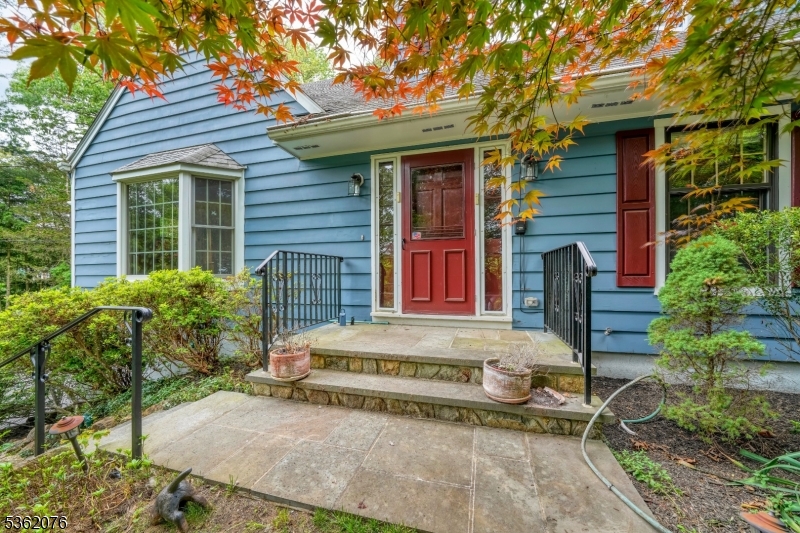 This custom built Cape Cod is nestled on 1.9 private acres in Long Valley!
