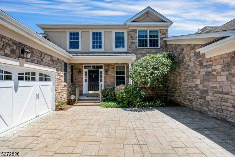 Enjoy the curb appeal of this beautiful Cabernet townhouse,  it even has a  a private driveway.
