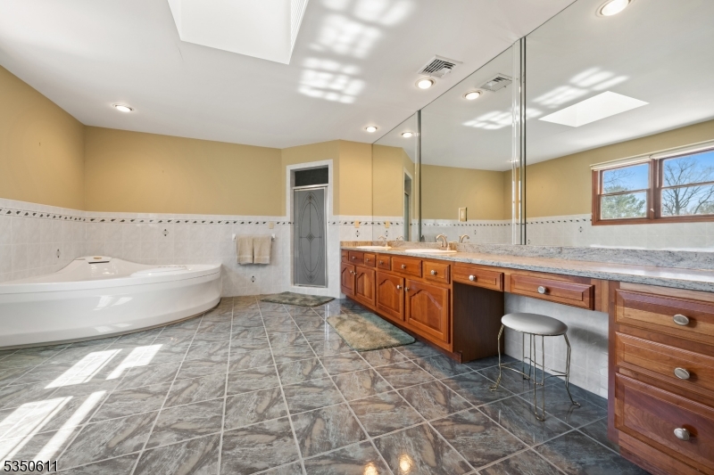 Primary Bathroom Jetted tub and walk-in shower, double-vanity