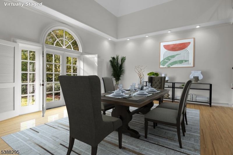 Dining Room w- french door to beautiful backyard Virtually stage