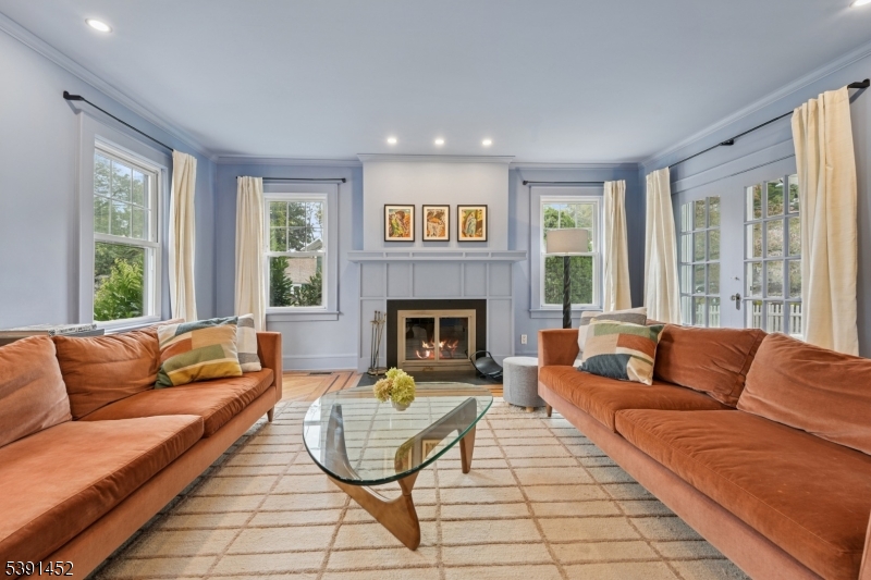 Living Room Wood Burning Fireplace w/ custom facade