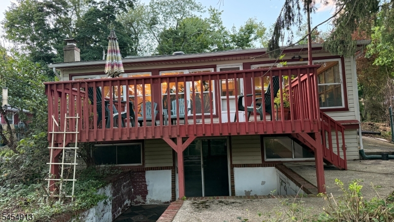 This is the backyard that could be yours. Walkout basement to a slate patio under the deck.