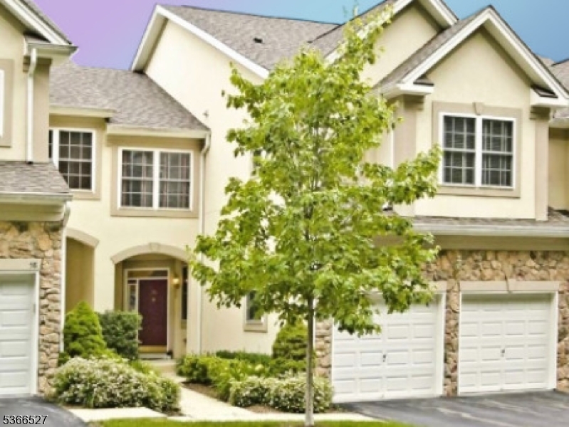 Spacious 4 BR/3.1 BA townhome w/ 2 car garage and 2 car driveway