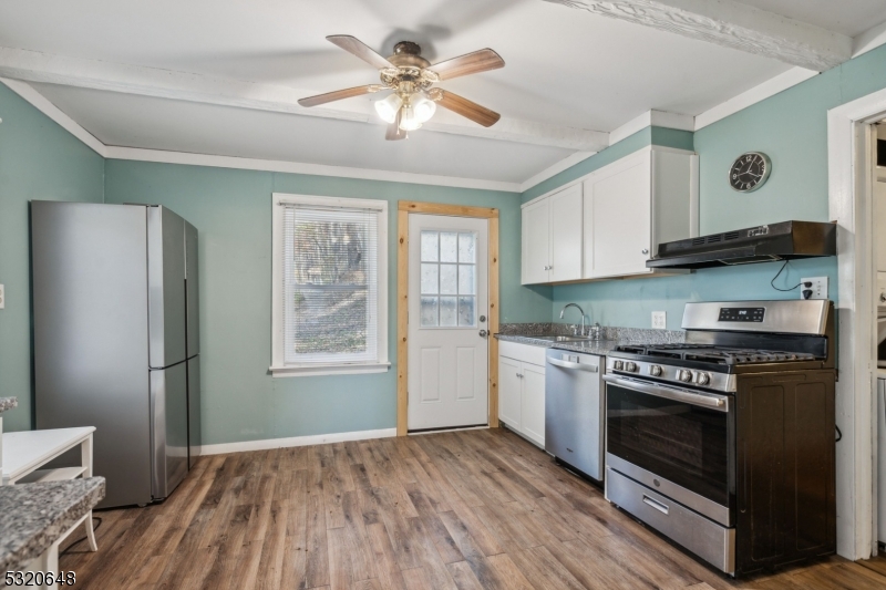 Updated kitchen with a side door entry