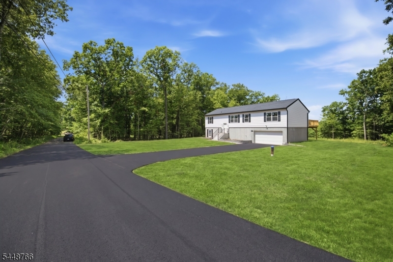Paved road infront & driveway