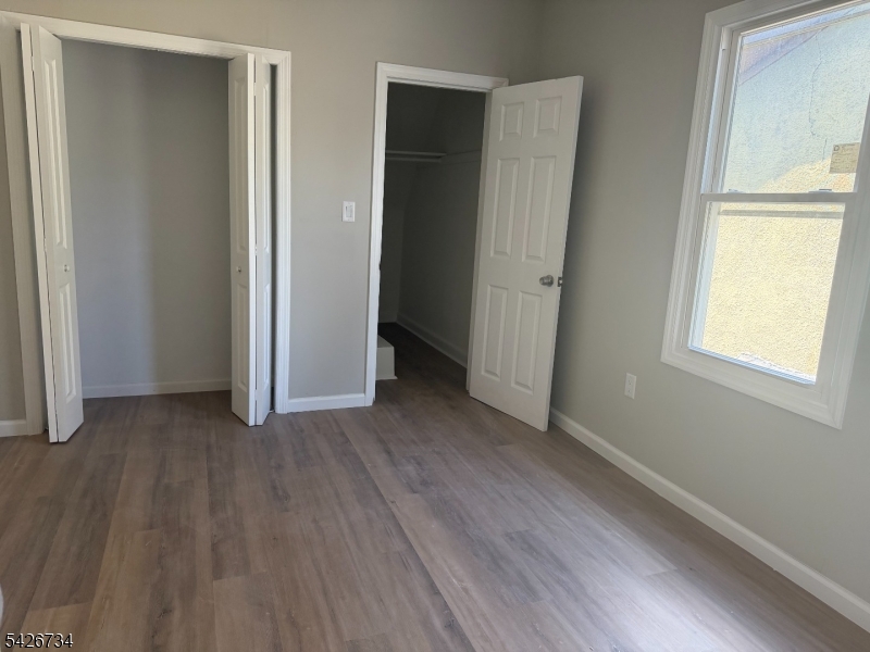 Bedroom with walk in closet