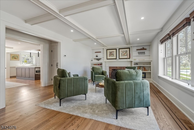 Living room w/ wood burning fp