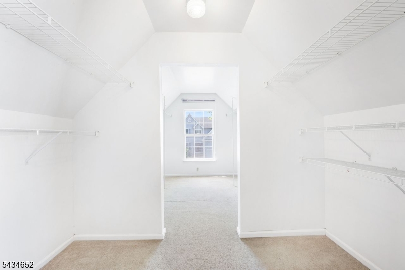 Primary Bedroom Walk In Closet