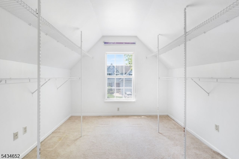 Primary Bedroom Walk In Closet