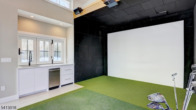 Pool house golf simulator