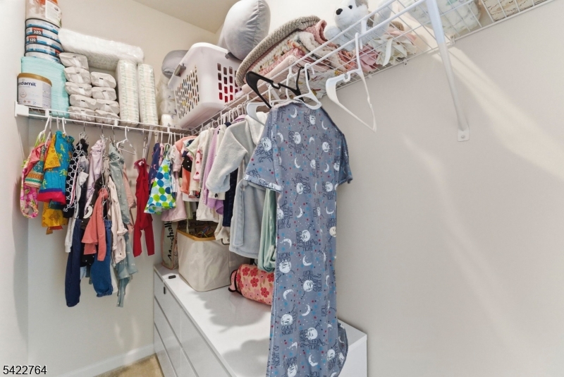 Closet in secondary bedroom