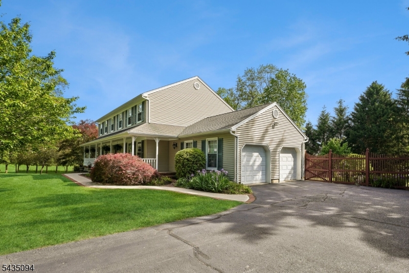 2 Car Garage w/ Ample Driveway