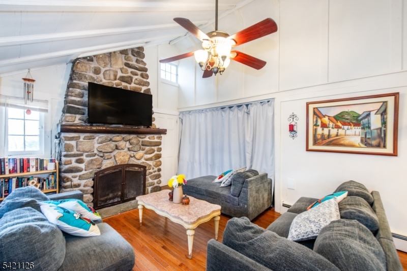 Living Room w/ Stone Fireplace