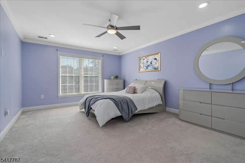 Bedroom with walk in closet