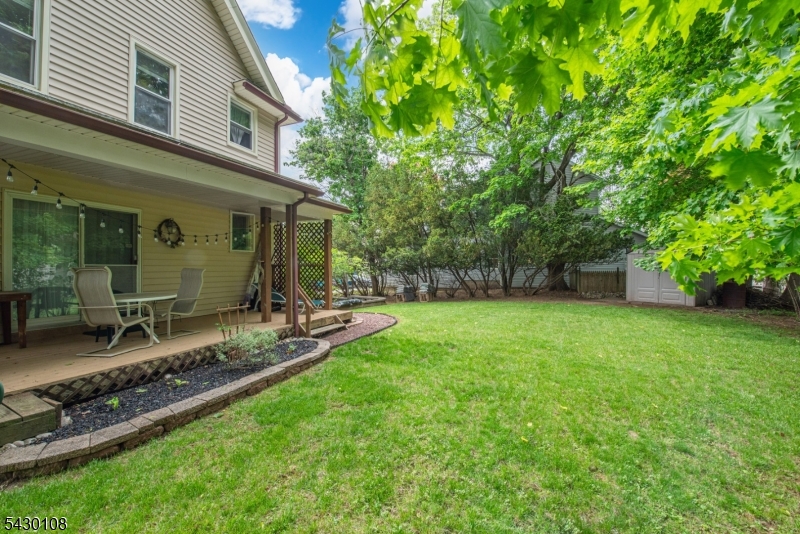 BACKYARD W/ DECK OFF UNIT 1