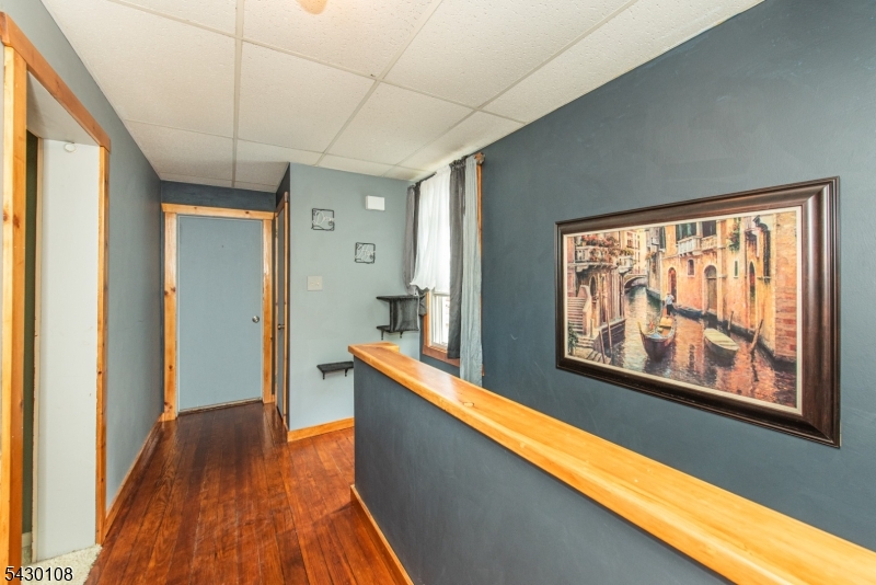 UNIT 2 HALL w/ HARDWOOD FLOORS