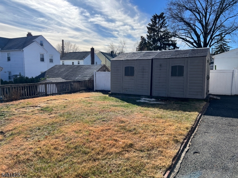 Back yard w/storage sheds
