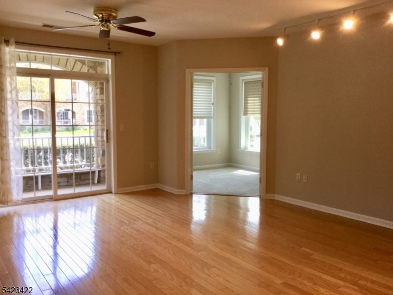 View of living room and den