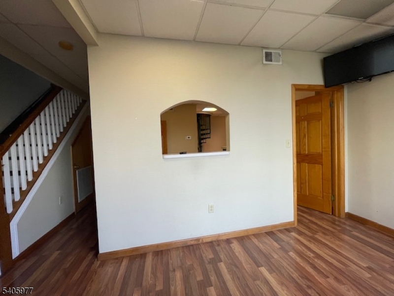 Living room, stairs to 2nd fl