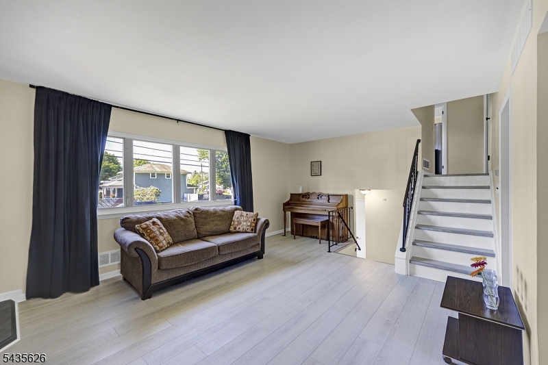 Living Rm leads to the Stairs