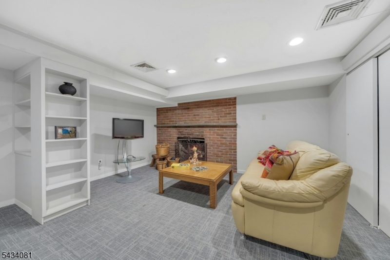 basement with gas fireplace