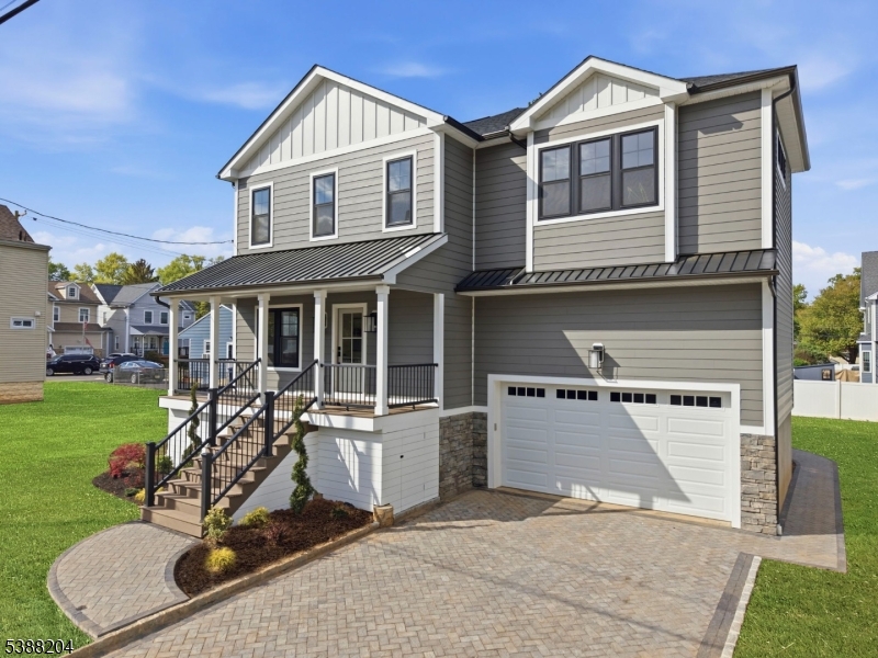 2 car garage & paver driveway