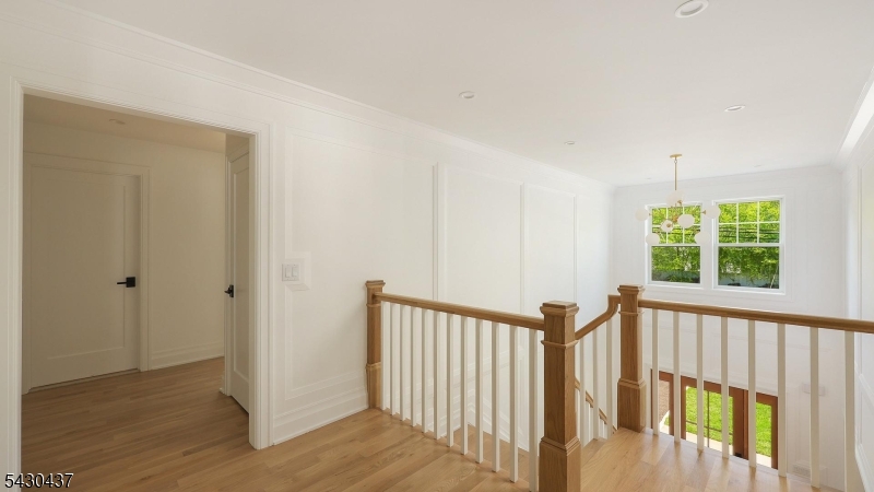 Upstairs hall overlooks foyer